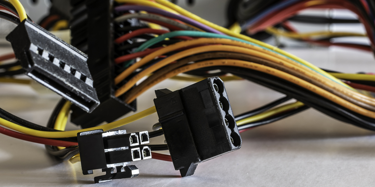 Detail of power supply unit with colored cables and peripheral connectors